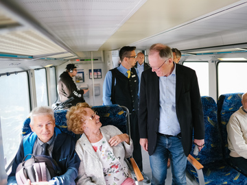 Fahrkartenkontrolle im Metronom und Gespräche mit Fahrgästen